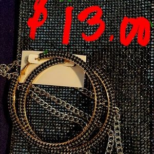 Black hoop earrings with a matching bling mini bag